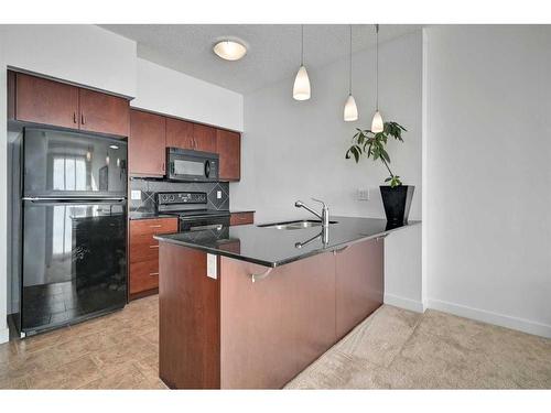 1906-8880 Horton Road Sw, Calgary, AB - Indoor Photo Showing Kitchen