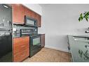 1906-8880 Horton Road Sw, Calgary, AB  - Indoor Photo Showing Kitchen 