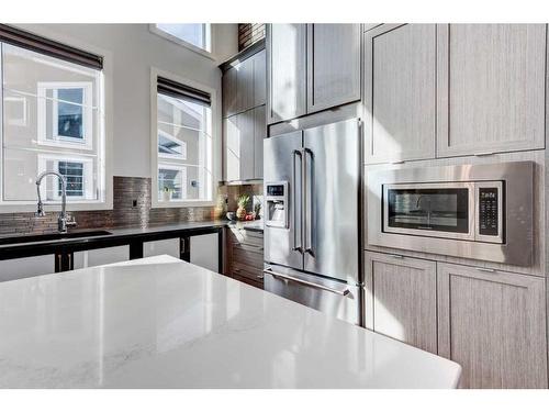 61 Paintbrush Park, Rural Rocky View County, AB - Indoor Photo Showing Kitchen With Stainless Steel Kitchen With Upgraded Kitchen