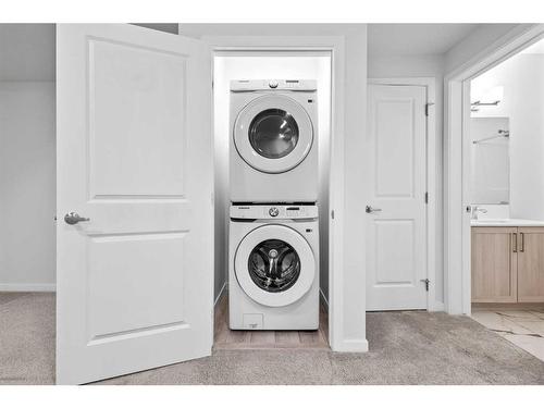 156 Walcrest Boulevard Se, Calgary, AB - Indoor Photo Showing Laundry Room