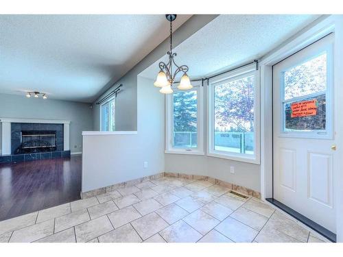 307 Hamptons Mews Nw, Calgary, AB - Indoor With Fireplace