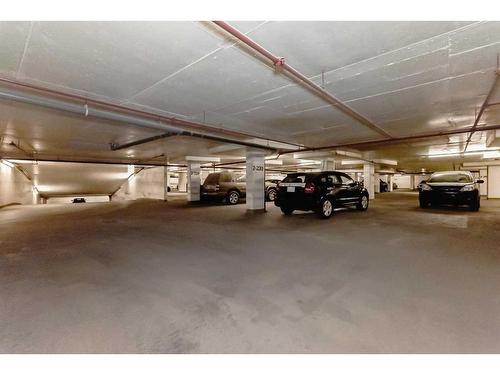 1407-325 3 Street Se, Calgary, AB - Indoor Photo Showing Garage