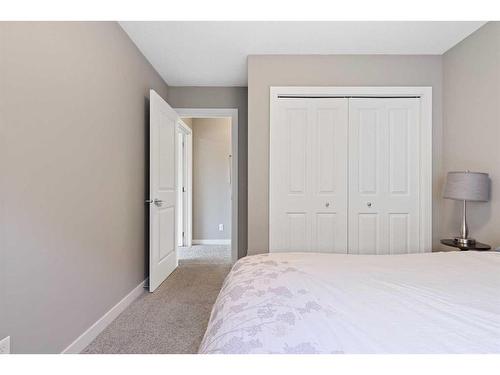 1464 Copperfield Boulevard Se, Calgary, AB - Indoor Photo Showing Bedroom