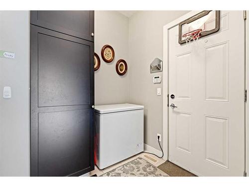 1464 Copperfield Boulevard Se, Calgary, AB - Indoor Photo Showing Laundry Room