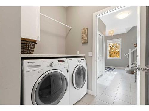 1464 Copperfield Boulevard Se, Calgary, AB - Indoor Photo Showing Laundry Room