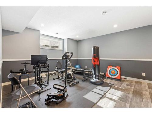 1464 Copperfield Boulevard Se, Calgary, AB - Indoor Photo Showing Gym Room