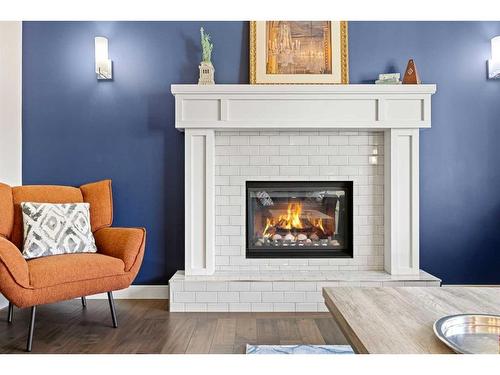 1464 Copperfield Boulevard Se, Calgary, AB - Indoor Photo Showing Living Room With Fireplace