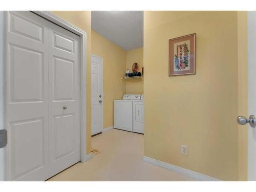 161 West Creek Boulevard, Chestermere, AB - Indoor Photo Showing Laundry Room