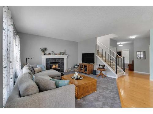 161 West Creek Boulevard, Chestermere, AB - Indoor Photo Showing Living Room With Fireplace