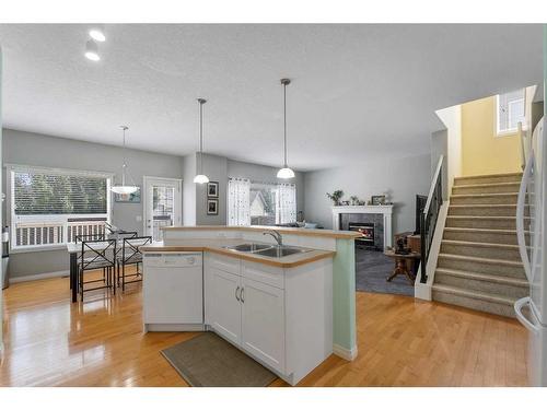 161 West Creek Boulevard, Chestermere, AB - Indoor Photo Showing Kitchen With Double Sink