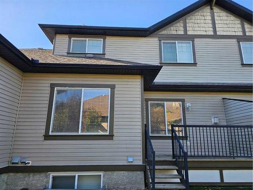 143-100 Coopers Common Sw, Airdrie, AB - Outdoor With Deck Patio Veranda With Exterior