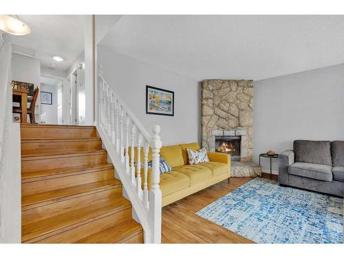 431 Templeview Drive Ne, Calgary, AB - Indoor Photo Showing Living Room With Fireplace