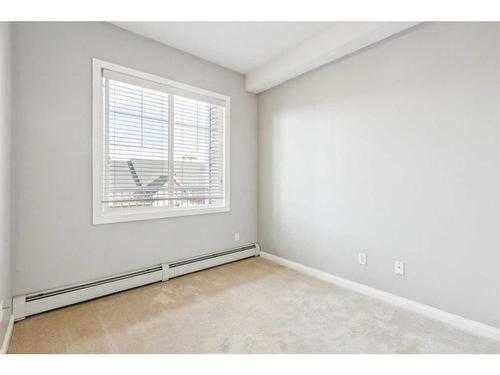 304-8 Prestwick Pond Terrace Se, Calgary, AB - Indoor Photo Showing Other Room