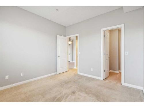 304-8 Prestwick Pond Terrace Se, Calgary, AB - Indoor Photo Showing Other Room