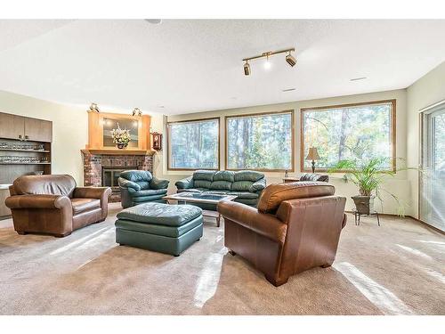 76 Mt Copper Green Se, Calgary, AB - Indoor Photo Showing Living Room With Fireplace