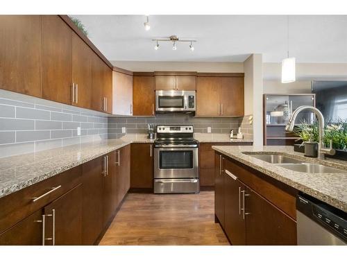 535 Redstone View Ne, Calgary, AB - Indoor Photo Showing Kitchen With Double Sink With Upgraded Kitchen