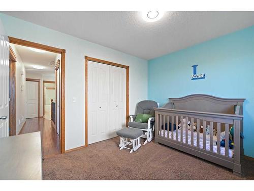 264 Ranch Close, Strathmore, AB - Indoor Photo Showing Bedroom