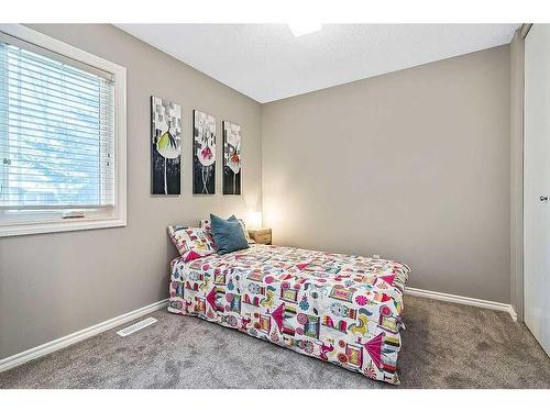 11 Midpark Drive Se, Calgary, AB - Indoor Photo Showing Bedroom