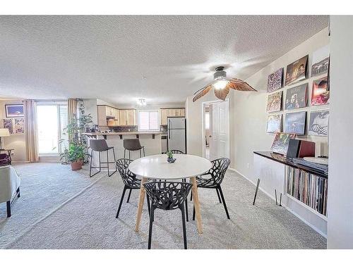 1102-10 Prestwick Bay Se, Calgary, AB - Indoor Photo Showing Dining Room