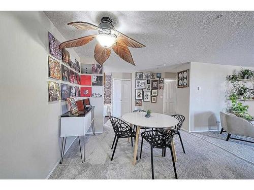 1102-10 Prestwick Bay Se, Calgary, AB - Indoor Photo Showing Dining Room