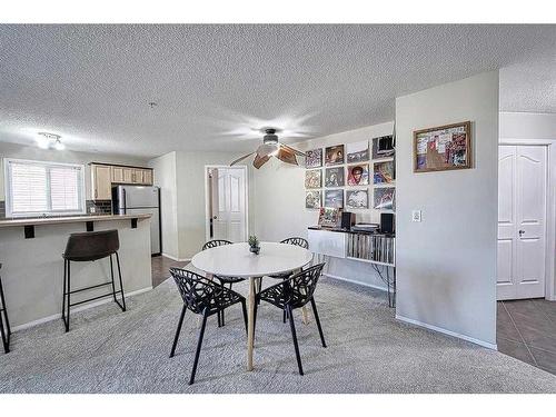 1102-10 Prestwick Bay Se, Calgary, AB - Indoor Photo Showing Dining Room