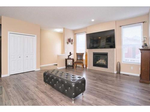 367 Auburn Crest Way Se, Calgary, AB - Indoor Photo Showing Living Room With Fireplace