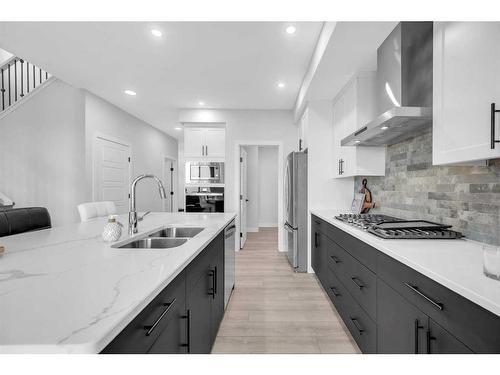 145 Amblefield Terrace Nw, Calgary, AB - Indoor Photo Showing Kitchen With Double Sink With Upgraded Kitchen