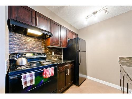 313-195 Kincora Glen Road Nw, Calgary, AB - Indoor Photo Showing Kitchen