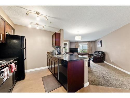 313-195 Kincora Glen Road Nw, Calgary, AB - Indoor Photo Showing Kitchen