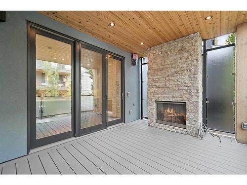 826 Durham Avenue Sw, Calgary, AB -  With Fireplace With Deck Patio Veranda With Exterior