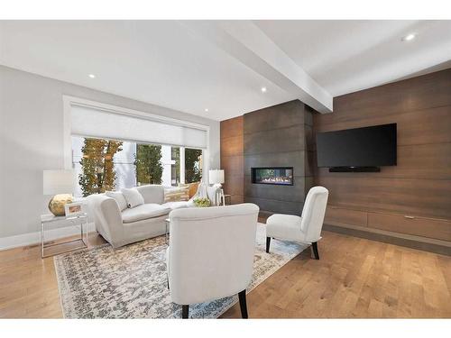 826 Durham Avenue Sw, Calgary, AB - Indoor Photo Showing Living Room With Fireplace