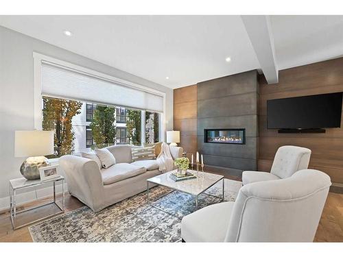 826 Durham Avenue Sw, Calgary, AB - Indoor Photo Showing Living Room With Fireplace