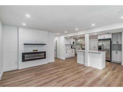 304 Huntbourne Hill Ne, Calgary, AB - Indoor With Fireplace