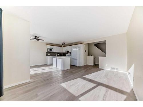 1 Royal Elm Way Nw, Calgary, AB - Indoor Photo Showing Living Room