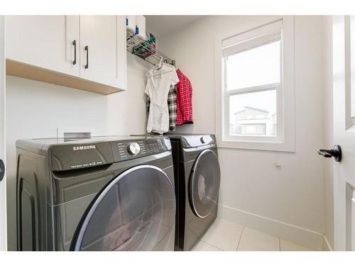 55 Walcrest View Se, Calgary, AB - Indoor Photo Showing Laundry Room