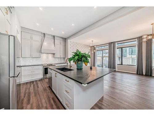 11 West Grove Common Sw, Calgary, AB - Indoor Photo Showing Kitchen With Double Sink With Upgraded Kitchen