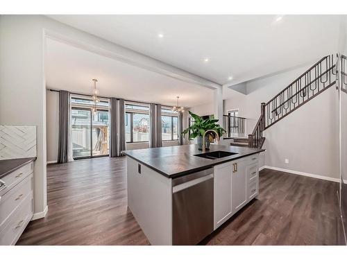 11 West Grove Common Sw, Calgary, AB - Indoor Photo Showing Kitchen With Double Sink