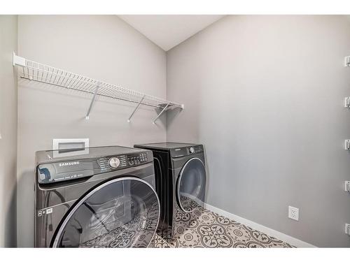 11 West Grove Common Sw, Calgary, AB - Indoor Photo Showing Laundry Room