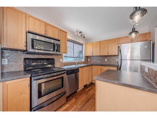 160 Elgin Meadows View Se, Calgary, AB - Indoor Photo Showing Kitchen With Stainless Steel Kitchen With Double Sink