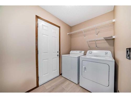 455 Cranston Drive Se, Calgary, AB - Indoor Photo Showing Laundry Room