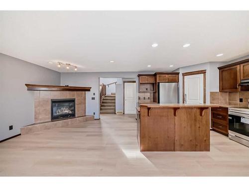 455 Cranston Drive Se, Calgary, AB - Indoor With Fireplace