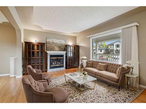 413 26 Avenue Nw, Calgary, AB - Indoor Photo Showing Living Room With Fireplace