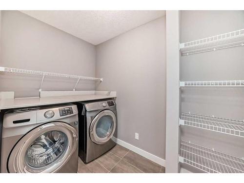 558 Sherwood Boulevard Nw, Calgary, AB - Indoor Photo Showing Laundry Room