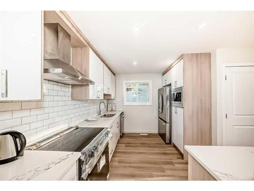 103 Olympia Drive Se, Calgary, AB - Indoor Photo Showing Kitchen