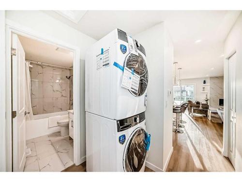 103 Olympia Drive Se, Calgary, AB - Indoor Photo Showing Laundry Room