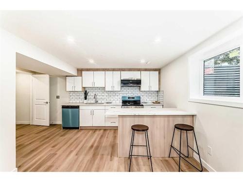 103 Olympia Drive Se, Calgary, AB - Indoor Photo Showing Kitchen With Upgraded Kitchen