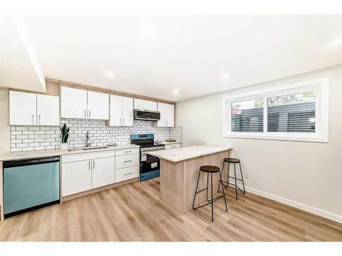 103 Olympia Drive Se, Calgary, AB - Indoor Photo Showing Kitchen With Upgraded Kitchen