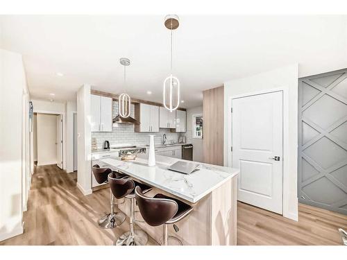 103 Olympia Drive Se, Calgary, AB - Indoor Photo Showing Kitchen With Upgraded Kitchen