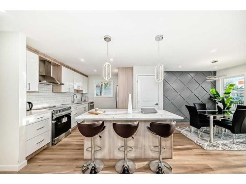 103 Olympia Drive Se, Calgary, AB - Indoor Photo Showing Kitchen With Upgraded Kitchen