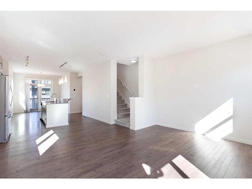 16 Walden Walk Se, Calgary, AB - Indoor Photo Showing Living Room